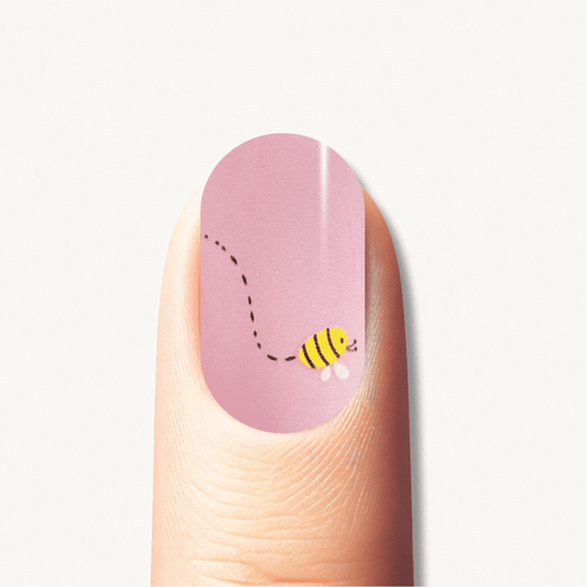 ASTRID nude floral UV gel nail strips with blue and yellow flowers